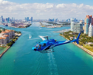 yacht in miami with helicopter